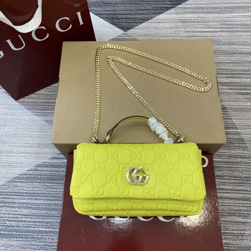 G*u*i top handle bags